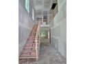 Interior view of new home with unfinished staircase and drywall at 1664 Crestridge Se Dr, Marietta, GA 30067