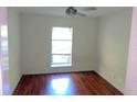 Simple bedroom with hardwood floors and a window at 2805 Northeast Ne Expy # B36, Atlanta, GA 30345