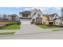 Beautiful two-story home featuring a two-car garage and modern design at 4790 Briscoe Dr, Cumming, GA 30028