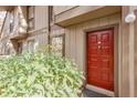 Exterior view showing the front entrance with a red door at 1302 Woodcliff Dr, Atlanta, GA 30350