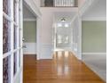 Two-story entry with hardwood floors, and a view to the Gathering room at 3419 Concord Loop, Atlanta, GA 30349