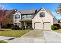 Charming two-story home with well-manicured lawn and two-car garage at 108 Laurel Bay Se Dr, Loganville, GA 30052
