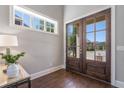 Bright entryway with hardwood floors and double doors at 3909 Collarton Close Se, Smyrna, GA 30080