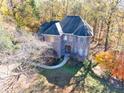 Brick house with a large yard, seen from above at 3830 High Point Cir, Cumming, GA 30041