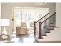 Elegant staircase and entryway with hardwood floors at 443 Wimbledon Ne Rd, Atlanta, GA 30324