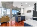 Modern kitchen with blue cabinets, white counters, and stainless steel appliances at 3324 Peachtree Ne Rd # 1813, Atlanta, GA 30326