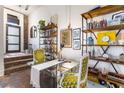 Bright home office featuring glass desk and built-in shelving at 978 North Ne Ave # 107, Atlanta, GA 30306