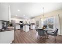 Open concept kitchen features an island and breakfast area at 1107 Silverbrooke Dr, Powder Springs, GA 30127