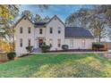 White two-story house with landscaping at 3782 Brookside Pkwy, Decatur, GA 30034