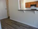 Bright dining area with tile flooring and access to kitchen at 52 Providence Oak Ct, Lawrenceville, GA 30046