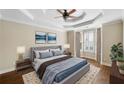 Main bedroom with bay window and hardwood floors at 255 Kendemere Pointe, Roswell, GA 30075