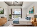 Inviting bedroom features a neutral color palette, a large window with natural light, and stylish furnishings at 563 Memorial Se Dr # 503, Atlanta, GA 30312