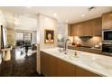 Gourmet kitchen features marble countertops, wooden cabinets, and modern appliances at 75 14Th St # 3640, Atlanta, GA 30309