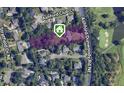 Aerial view of a neighborhood property with a large, treed lot near the golf course at 3368 Ashford Dunwoody Rd, Atlanta, GA 30319