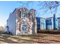 Traditional two-story home featuring neutral siding, and symmetrical window placement at 1184 Red Oak Cv, Tucker, GA 30084