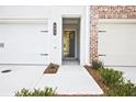 Inviting front entrance with the address number and a view into the home at 695 Sunstone Ln, Lawrenceville, GA 30043