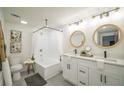 Modern bathroom with double vanity, soaking tub, and updated fixtures at 599 Quillian Ave., Decatur, GA 30032