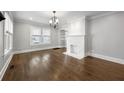 Bright living room boasts hardwood floors, a decorative fireplace, and ample natural light at 1196 Oleander Nw St, Atlanta, GA 30314