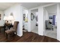 Bright hallway with hardwood floors and access to bedrooms and bath at 75 Fair Haven Se Way, Smyrna, GA 30080