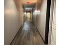 Apartment building hallway with neutral walls and flooring at 870 Mayson Turner Nw Rd # 1419, Atlanta, GA 30314