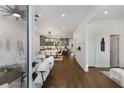 Bright, open-concept living space with hardwood floors, modern furniture, and lots of natural light at 60 Newcastle Sw St, Atlanta, GA 30314