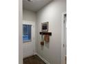 Entryway featuring neutral paint colors, coat rack and luxury vinyl plank flooring at 241 Ivey Ter # 42, Temple, GA 30179