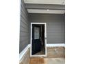A welcoming front entrance area with space for an outdoor rug at 241 Ivey Ter # 42, Temple, GA 30179