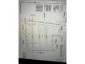 Land plat map showing the subdivision of a plot of land into multiple tracts at 542 Palm St, Holly Springs, GA 30115