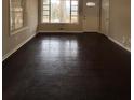 Living room with dark hardwood floors and large windows at 2069 Bixler Cir, Decatur, GA 30032