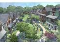 An aerial rendering showcases a neighborhood with manicured lawns and sidewalks at 1995 Catnap Ct, Chamblee, GA 30341