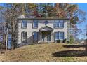 Charming home with covered porch and well maintained landscaping at 508 Sutters Mill Rd, Stone Mountain, GA 30087