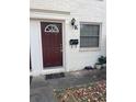 Burgundy front door with a fanlight window at 771 Jordan Ln # K, Decatur, GA 30033