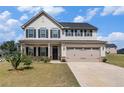 Beautiful two-story home with a two-car garage, classic design, and well-maintained landscaping at 467 Daffodil Ln, Mcdonough, GA 30253