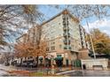 Brick building exterior, multiple balconies, and street-level retail at 230 E Ponce De Leon Ave # 524, Decatur, GA 30030