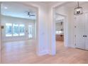 Open concept entry hall, view of kitchen and living room at 211 Iroquois Ct, Covington, GA 30014