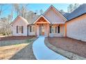 Welcoming front entry with walkway leading to front door at 211 Iroquois Ct, Covington, GA 30014