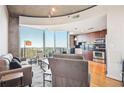 Modern living room with hardwood floors and city view at 361 17Th Nw St # 2208, Atlanta, GA 30363