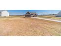 Expansive property with a craftsman style home and long driveway at 1452 Alcovy Station Rd, Covington, GA 30014