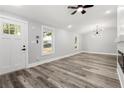 Spacious living room featuring hardwood floors and a fireplace at 358 Roy Sw St, Atlanta, GA 30310