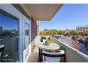 Balcony featuring a table and chairs, with a nice view of trees and other buildings at 375 Ralph Mcgill Blvd # 603, Atlanta, GA 30312