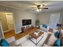 Spacious living room featuring hardwood floors and ample natural light at 1877 Lomita Rd, Atlanta, GA 30316