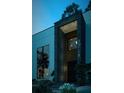 Modern home entrance featuring recessed lighting and a stylish black front door at 2719 Winding Ne Ln, Brookhaven, GA 30319