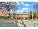 Brick building with large windows, metal roof, and landscaping at 1112 Delaware Se Ave, Atlanta, GA 30316