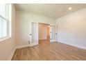 Bright office with hardwood floors and glass French doors at 138 Henley St, Canton, GA 30114