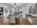 Bright dining room with hardwood floors and modern light fixture at 3483 Winter Chase Dr, Marietta, GA 30062