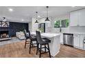 Modern white kitchen with stainless steel appliances and an island at 2873 Bob Bettis Rd, Marietta, GA 30066