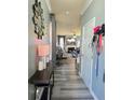 Bright entryway with gray walls, wood-look floors, and a console table at 5901 Seabright Ln, Atlanta, GA 30349