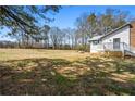 View of back of the home with the large backyard at 5333 Pine Valley Rd, Powder Springs, GA 30127