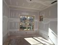 Unfinished bedroom with drywall and wood flooring at 1975 Sage Lake Bend Sw, Marietta, GA 30064