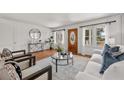 Bright living room with hardwood floors, natural light, and stylish furnishings at 318 Stewart Nw Ave, Marietta, GA 30064